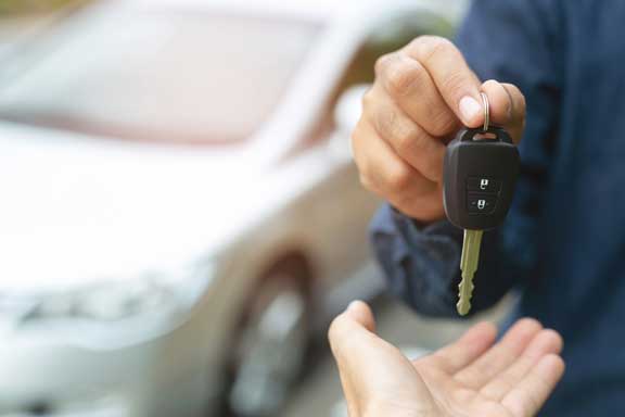 handing over the car keys